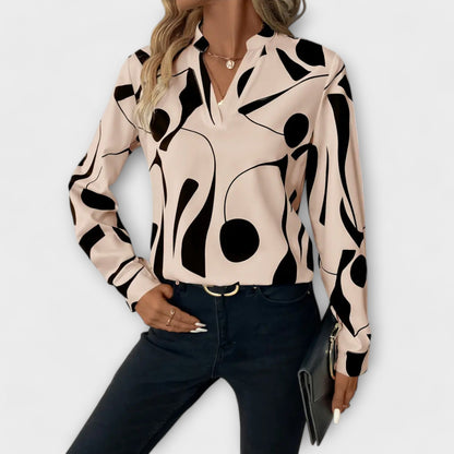 Elegant long-sleeved blouse with pointed neckline